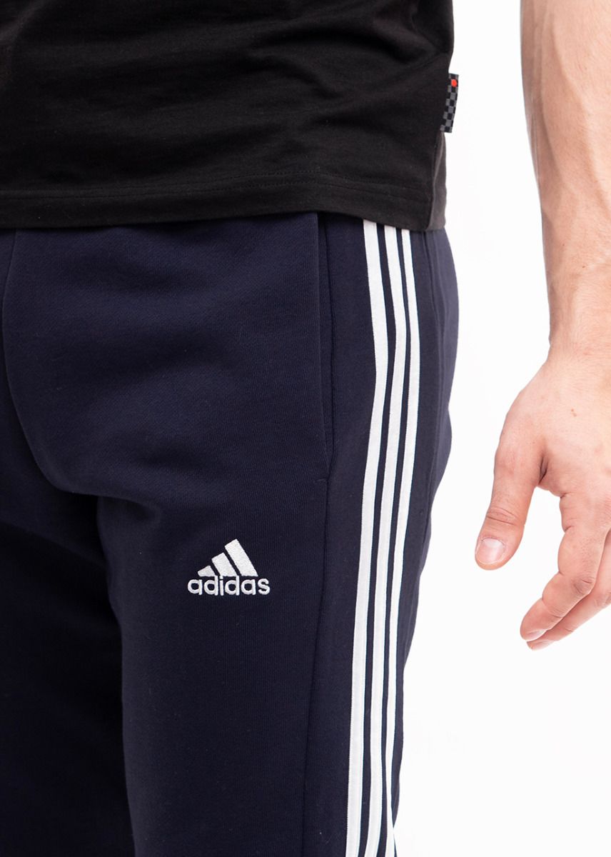 adidas Pánske tepláky Essentials French Terry Tapered Cuff 3-Stripes IC9406