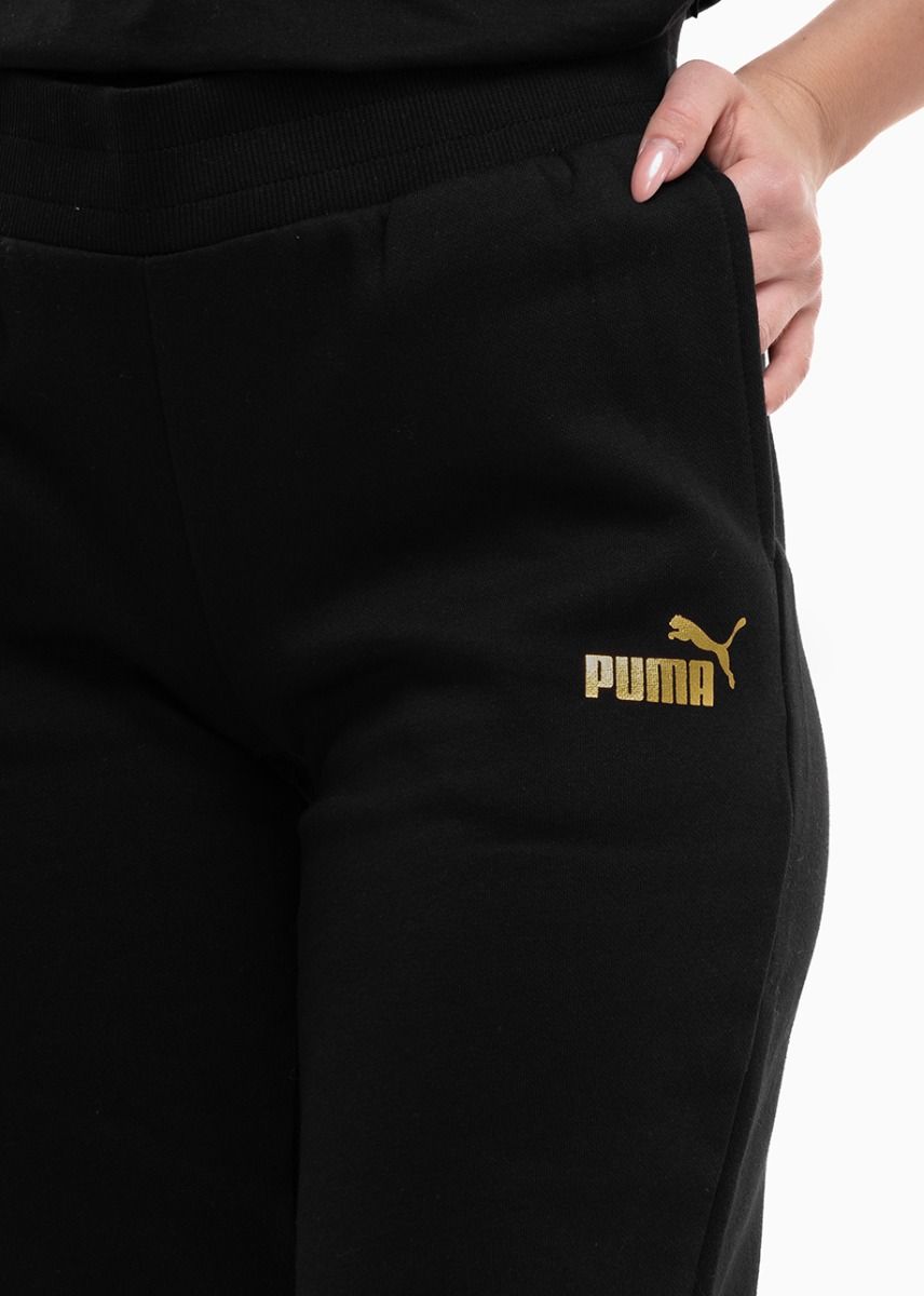 PUMA Dámske tepláky ESS+ Metallic Pants FL 849959 01