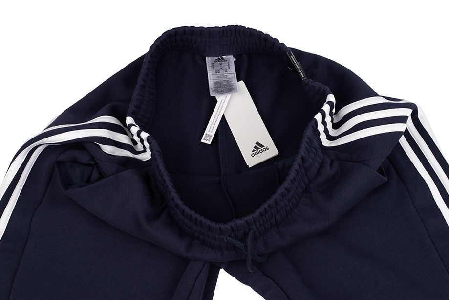 adidas Pánske tepláky Essentials Fleece 3-Stripes Tapered Cuff IJ6493 adidas Pánske tepláky Essentials Fleece 3-Stripes Tapered Cuff IJ6493