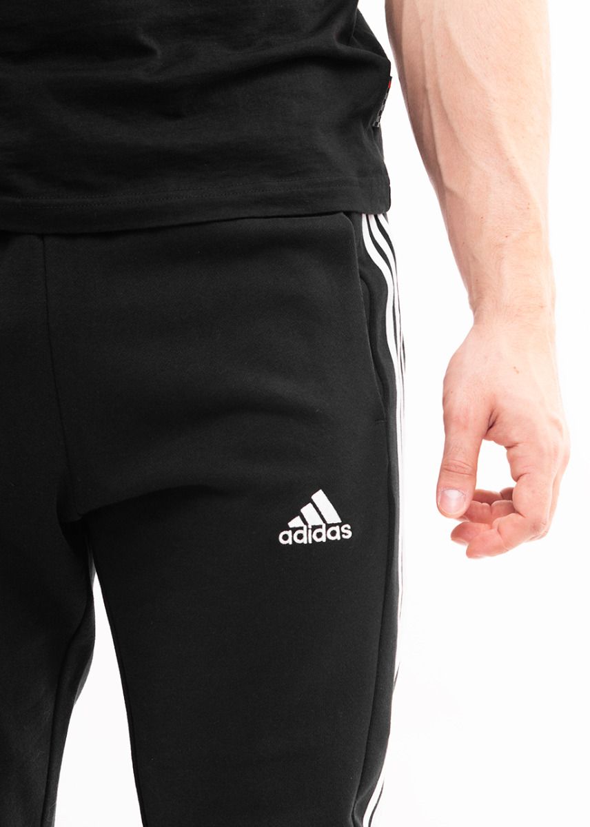 adidas Pánske tepláky Essentials French Terry Tapered Cuff 3-Stripes HA4337