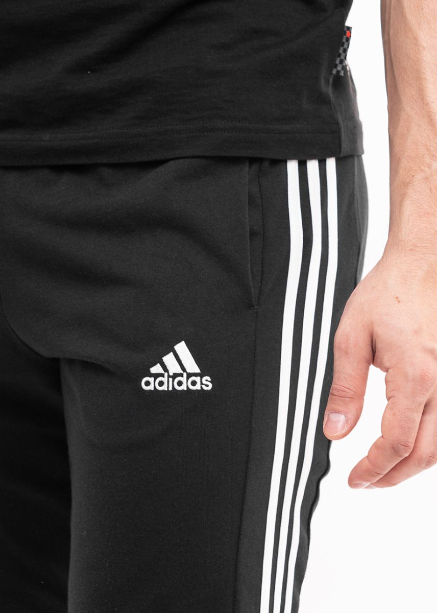 adidas Pánske tepláky Essentials Single Jersey Tapered Open Hem 3-Stripes IC0044