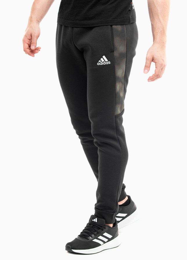 adidas Pánske nohavice męskie Essentials Camo Print Fleece Pants HL6929 adidas Pánske nohavice męskie Essentials Camo Print Fleece Pants HL6929