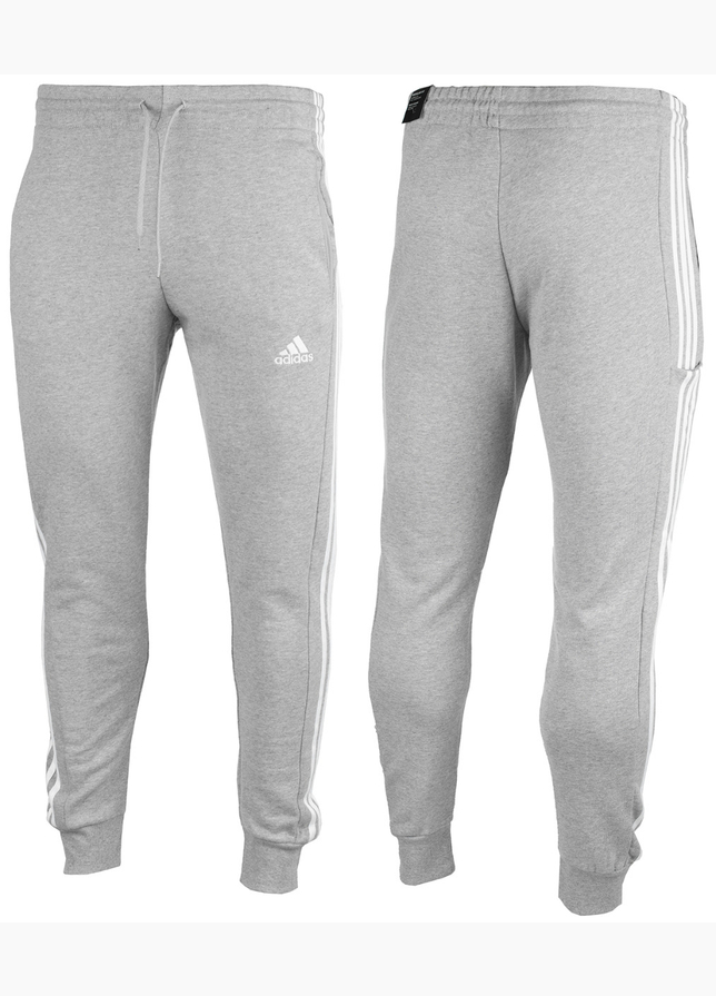 adidas Pánske tepláky Essentials French Terry Tapered Cuff 3-Stripes IC9407 adidas Pánske tepláky Essentials French Terry Tapered Cuff 3-Stripes IC9407