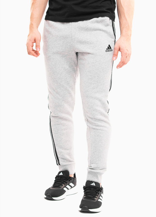 adidas Tepláky Pánske Essentials Tapered Cuff 3 Stripes GK8889 adidas Tepláky Pánske Essentials Tapered Cuff 3 Stripes GK8889